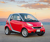 AUT 44 RK0091 01
2009 Smart Fortwo Passion Coupe Red And Silver 3/4 Front View On Pavement By Lake
