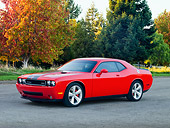 AUT 44 RK0017 01
2009 Dodge Challenger SRT8 Limited Edition Red Black Stripe 3/4 Front View On Pavement By Trees