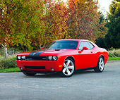 AUT 44 RK0018 01
2009 Dodge Challenger SRT8 Limited Edition Red Black Stripe 3/4 Front View On Pavement By Trees