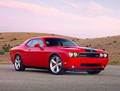 AUT 44 RK0021 01
2009 Dodge Challenger SRT8 Limited Edition Red Black Stripe 3/4 Front View On Pavement By Hills