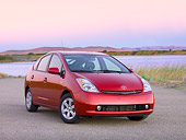 AUT 44 RK0025 01
2009 Toyota Prius Red 3/4 Front View On Pavement By Hills