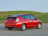 AUT 44 RK0028 01
2009 Toyota Prius Red 3/4 Rear View On Pavement By Hills