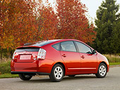 AUT 44 RK0029 01
2009 Toyota Prius Red 3/4 Rear View On Pavement By Autumn Trees