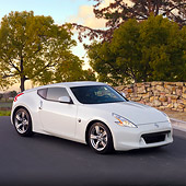 AUT 44 RK0052 01
2009 Nissan 370Z Coupe White 3/4 Front View On Street