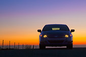 AUT 45 BK0002 01
2010 Honda Insight Blue Front View On Pavement With Sunset