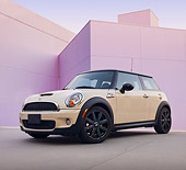 AUT 45 BK0009 01
2010 Mini Cooper S White 3/4 Front View On Concrete By Structure
