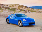 AUT 45 RK0014 01
2010 Nissan 370Z Touring Blue 3/4 Front View On Beach