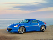 AUT 45 RK0017 01
2010 Nissan 370Z Touring Blue 3/4 Front View On Beach