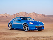 AUT 45 RK0018 01
2010 Nissan 370Z Touring Blue 3/4 Front View In Desert