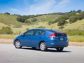 AUT 45 RK0022 01
2010 Honda Insight Hybrid Blue 3/4 Rear View On Pavement By Hills