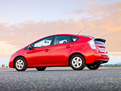 AUT 45 RK0027 01
2010 Toyota Prius Hybrid Red 3/4 Rear View On Pavement