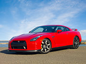 AUT 45 RK0041 01
2010 Nissan GT-R Red 3/4 Front View On Pavement By Water