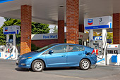AUT 45 RK0053 01
2010 Honda Insight Blue Profile View At Gas Station