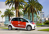AUT 45 RK0006 01
2010 Mitsubishi i MiEV White And Red 3/4 Front View On Pavement By Palm Trees
