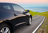 AUT 46 BK0040 01
2011 Honda CR-Z Black Detail On Road By Grassy Hillside