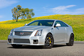 AUT 46 RK0026 01
2011 Cadillac CTS Silver 3/4 Front View On Pavement By Grassy Hills