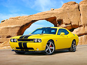 AUT 46 RK0032 01
2011 Dodge Challenger SRT8 Yellow With Black Stripe 3/4 Front View On Beach