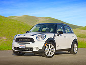 AUT 46 RK0044 01
2011 Mini Countryman White 3/4 Front View On Pavement By Grassy Hills