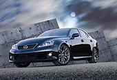 AUT 46 RK0060 01
2011 Lexus ISF Black 3/4 Front View On Pavement By Structure At Night