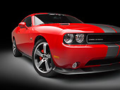 AUT 46 RK0135 01
2011 Dodge SRT8 Challenger Red With Gray Stripes 3/4 Front View In Studio