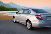 AUT 48 BK0006 01
2012 Honda Civic Silver 3/4 Rear View On Pavement By Beach