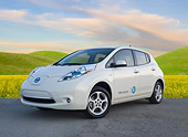 AUT 48 BK0008 01
2012 Nissan Leaf White 3/4 Front View On Pavement By Grassy Hills
