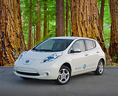 AUT 48 BK0011 01
2012 Nissan Leaf White 3/4 Front View On Pavement By Redwood Trees