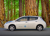 AUT 48 BK0012 01
2012 Nissan Leaf White Profile View On Pavement By Redwood Trees