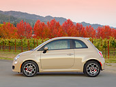 AUT 48 BK0059 01
2013 FIAT 500 Sport Mocha Latte Profile View On Pavement By Vineyard