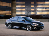 AUT 48 BK0071 01
2012 Toyota Corolla Black 3/4 Side View On Pavement By Glass Building