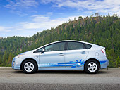 AUT 48 RK0023 01
2012 Toyota Prius Plug-In Hybrid Blue Profile View On Pavement By Mountains