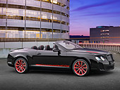 AUT 48 RK0029 01
2012 Bentley Continental Supersports ISR Convertible Black And Red 3/4 Side View In Parking Garage At Night