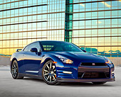 AUT 48 RK0055 01
2012 Nissan GT-R Deep Blue Pearl 3/4 Front View On Concrete By Glass Building At Dusk