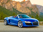 AUT 48 RK0103 01
2012 Audi R8 Spyder Blue 3/4 Front View On Pavement By Mountains
