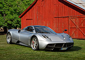AUT 48 RK0104 01
2012 Pagani Huayra Silver 3/4 Front View On Grass By Barn