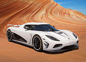AUT 49 RK0005 01
2013 Koenigsegg Agera R White 3/4 Front View On Sand By Dunes