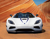 AUT 49 RK0006 01
2013 Koenigsegg Agera R White Front View On Sand By Dunes