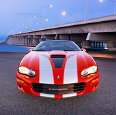 CAM 01 RK0081 01
2002 Chevy Camaro SS 35th Anniversary Convertible Red And Silver Head On Shot On Pavement By Bridge