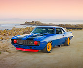 CAM 01 RK0187 01
1969 Chevrolet Camaro Z-28 Blue With Black Stripe And Yellow Wheels 3/4 Front View On Beach