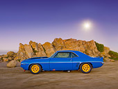 CAM 01 RK0190 01
1969 Chevrolet Camaro Z-28 Blue With Black Stripe And Yellow Wheels Profile View On Beach