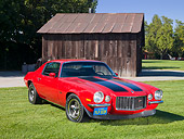 CAM 01 RK0223 01
1970 1/2 Chevrolet Camaro Z-28 RS Red With Black Stripes 3/4 Front View On Grass By Wooden Shed