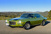 CAM 01 RK0282 01
1971 Chevrolet Camaro Z-28 RS Lime Green 3/4 Front View On Pavement By Hills