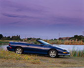 CAM 01 RK0004 03
1997 Chevrolet Camaro Z-28 Convertible Blue 3/4 Front View On Dirt
