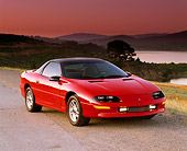 CAM 01 RK0051 04
1993 Chevrolet Camaro Z-28 Red 3/4 Front View On Dirt Road By Lake Mountains Filtered