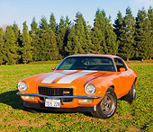 CAM 01 RK0162 01
1970 Chevrolet Camaro Z-28 Hugger Orange And White Stripe 3/4 Front View In Field