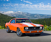 CAM 02 RK0065 01
1969 Chevrolet Camaro SS Orange With White Stripes 3/4 Front View On Pavement By Snow Capped Mountains