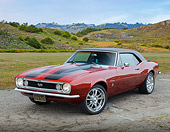 CAM 02 RK0185 01
1967 Chevrolet Camaro SS Red And Black 3/4 Front View On Gravel By Hills