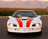 CAM 02 RK0018 06
1997 Chevrolet Camaro SS 30th Anniversary White With Red Stripes Head On View By Mountains