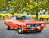 CAM 03 RK0225 01
1969 Chevrolet Camaro ZL-1 Orange 3/4 Front View On Pavement By Trees And Vineyard
