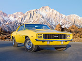CAM 03 RK0239 01
1969 Chevrolet COPO Camaro RS Yellow 3/4 Front View On Pavement By Snowy Mountains